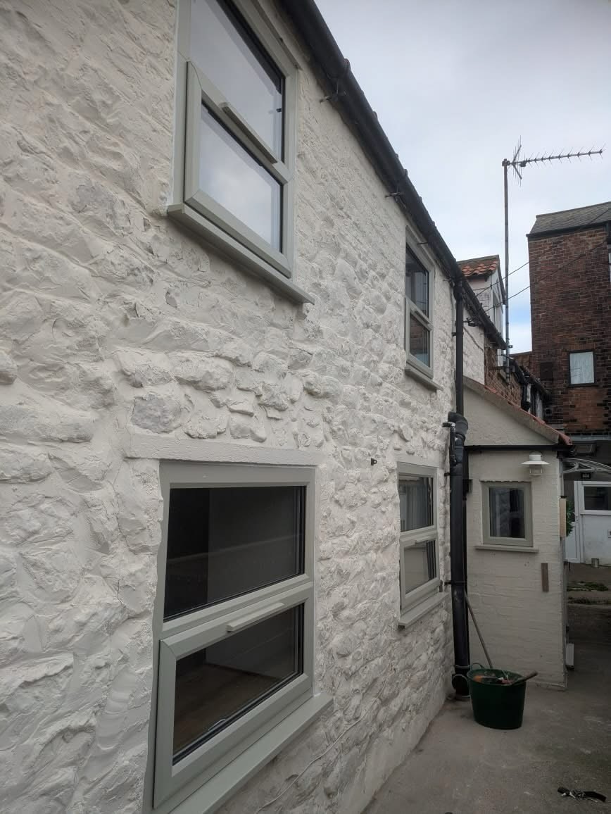 Pebble grey windows on a cottage